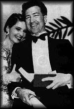 David Lynch and Isabella Rossellini with the Palm D'Or a Cannes